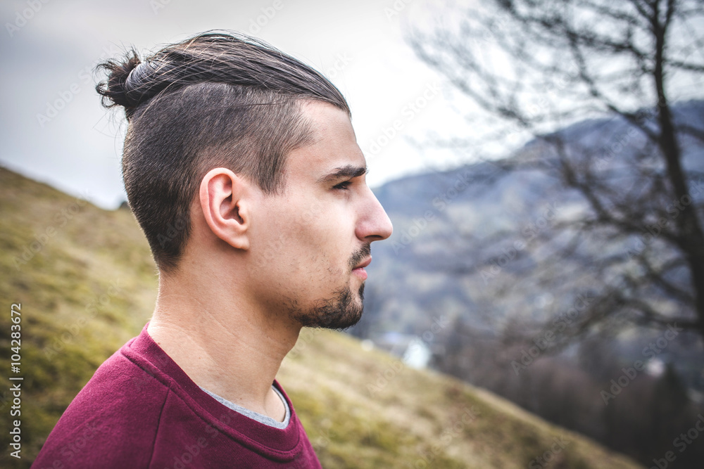 Young Man With Samurai TopKnot Haircut Stock Photo | Adobe Stock