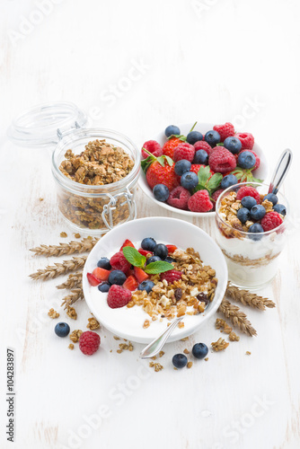 healthy breakfast with natural yogurt, muesli and berries