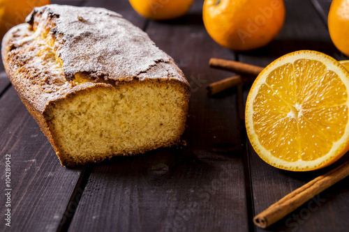Obraz na płótnie Orange cake on the corn flour with orange liqueur