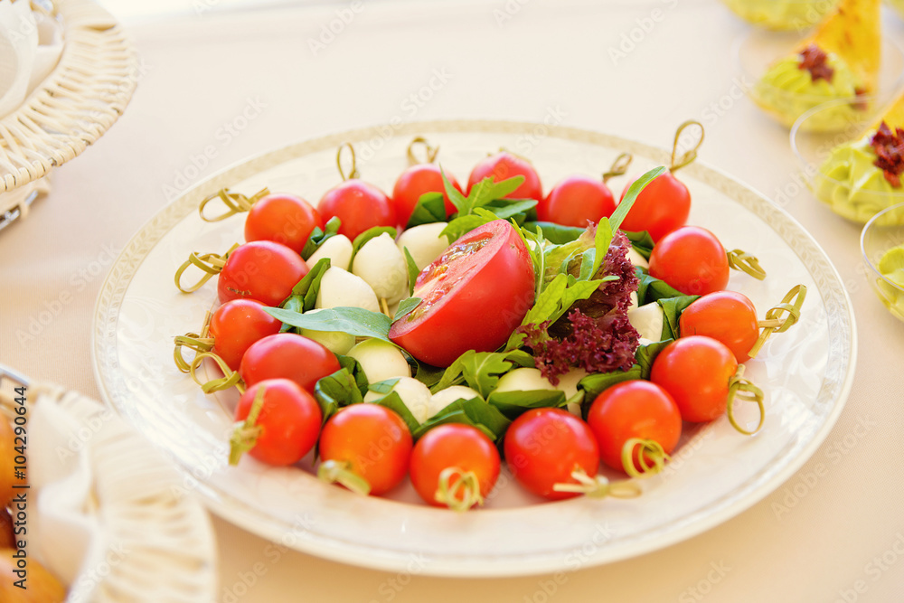 plate of vegetables and cheese 