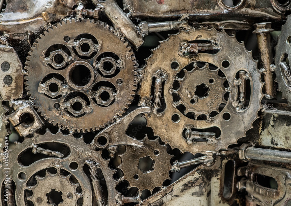 Fototapeta premium A pile of welded gears. Macro view