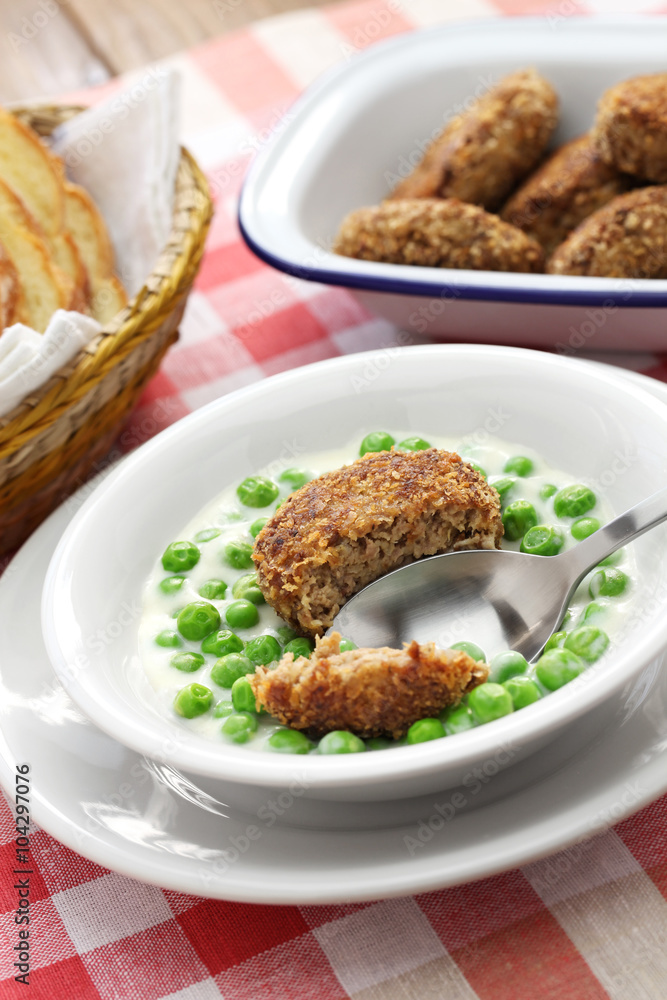 green peas fozelek (thich vegetable stew) and fasirt (fried meatball), hungarian cuisine green peas fozelek (thich vegetable stew) and fasirt (fried meatball), hungarian cuisine