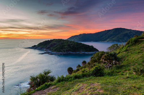 Beautiful sunset in promthep cape is a mountain of rock that extends into the sea in Phuket, Thailand © Southtownboy Studio