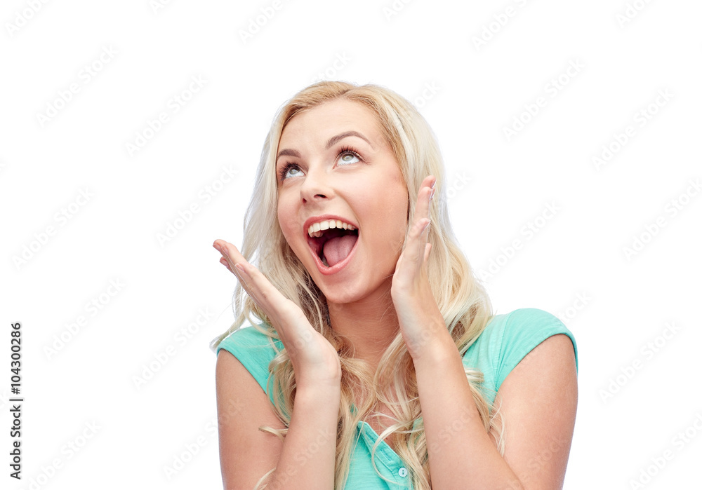 surprised smiling young woman or teenage girl surprised smiling young woman or teenage girl
