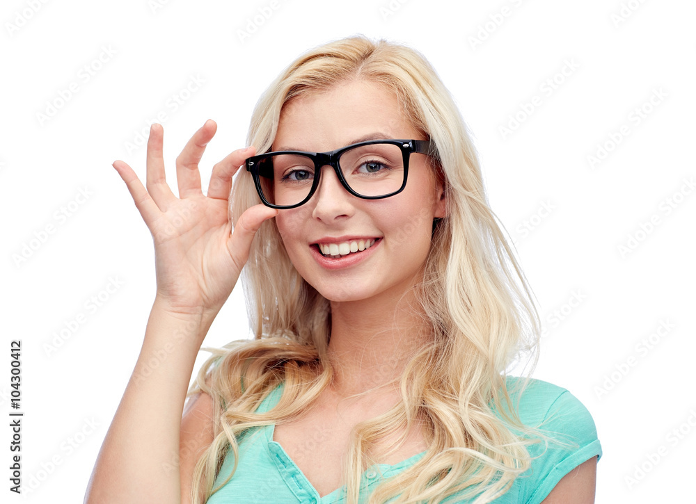happy young woman or teenage girl in glasses happy young woman or teenage girl in glasses
