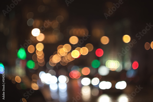 Blurry lights. Night city bokeh. Defocused cityscape. © 621513