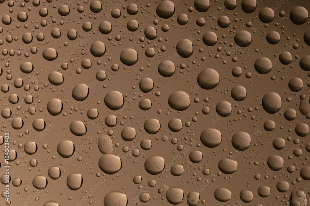 macro shot of liquid droplets with reflection. color background with water drops texture. gradient color macro shot of liquid droplets with reflection. color background with water drops texture. gradient color