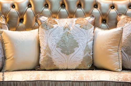 cCassic style pillows and sofa.
