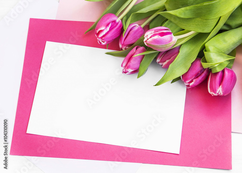 Easter holiday greeting with pink tulips