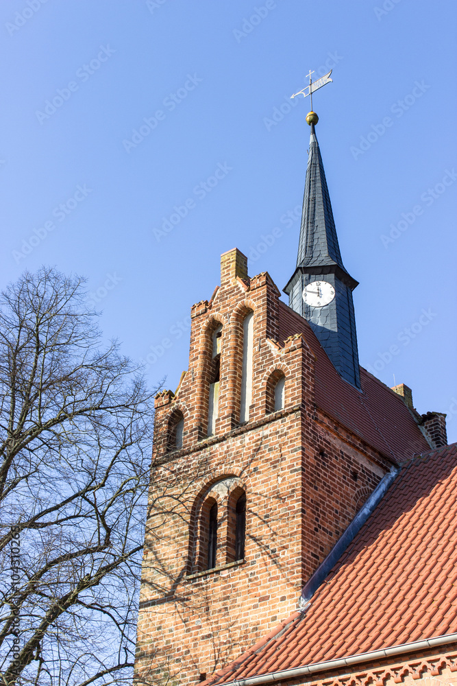  church / Steeple of a Gothic brick church