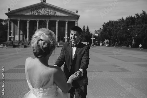 Young wedding couple walking 