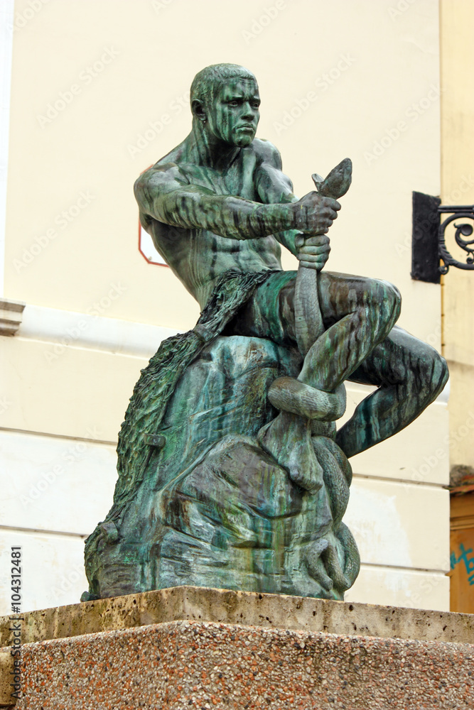 Naklejka premium Fisherman with Snake, statue