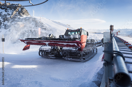 Snow Groomer in windy conditions photo