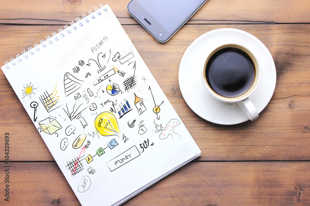 notebook, phone and coffee on table notebook, phone and coffee on table