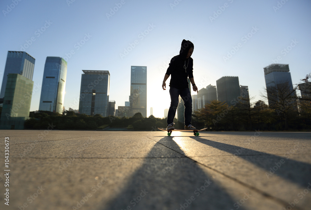 silhouette of skateboarder skateboarding at sunrise city silhouette of skateboarder skateboarding at sunrise city