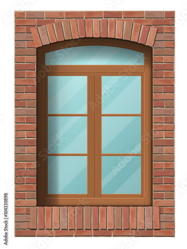 Arched window in brick wall