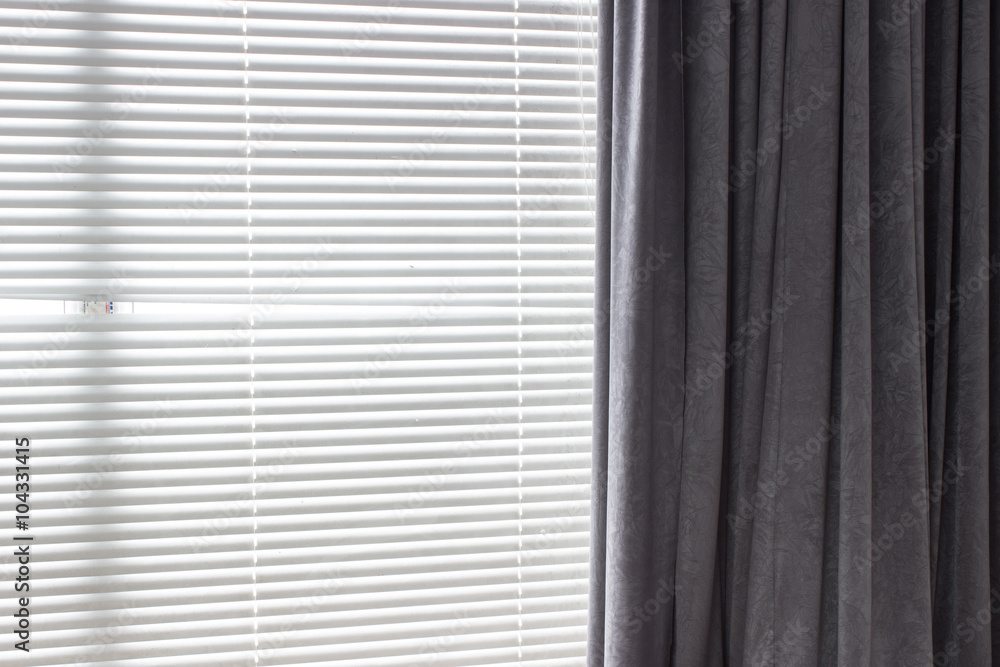 Fototapeta premium dark curtains and a white brick wall