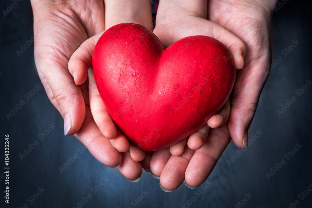 Red Heart on Palm of Woman and Child - Mother Day Symbol - obrazy, fototapety, plakaty 