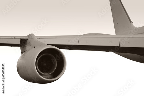 Flugzeugturbine / Die Nahaufnahme einer Flugzeugturbine am Seitenflügel eines Passagierflugzeugs. photo