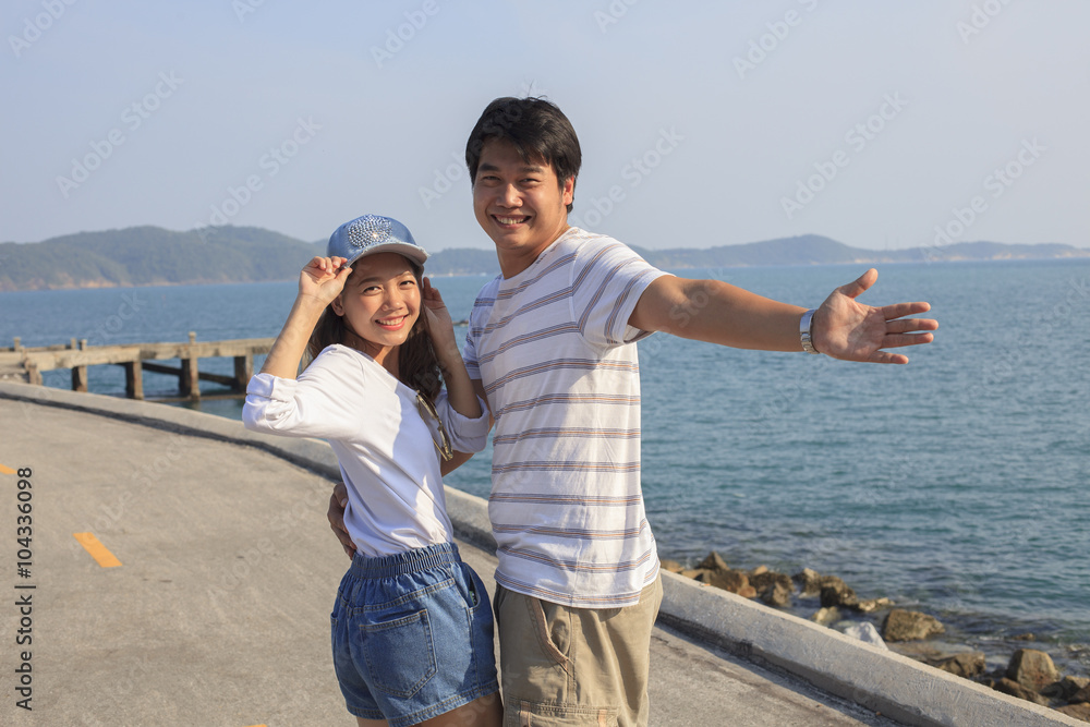 portrait of young man and woman relaxing and happy emotion on se