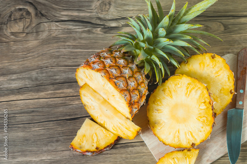 pineapple on the wood texture background
