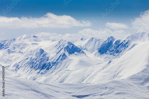 Panoramic view at snowy mountains