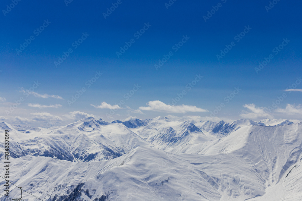 Panoramic view at snowy mountains