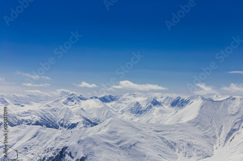 Panoramic view at snowy mountains