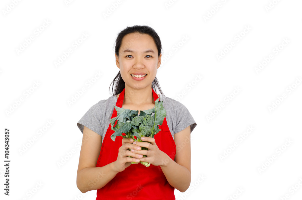 Happy woman holding broccoli ready to cooking,isolated on white background Happy woman holding broccoli ready to cooking,isolated on white background