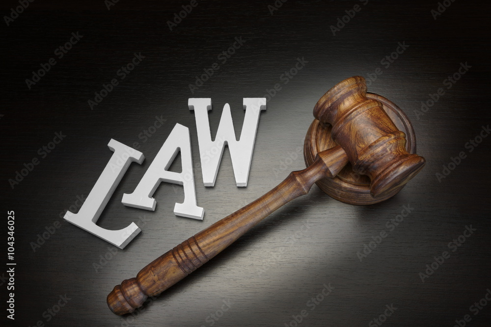 Judges Gavel And Sign Law On Wood Background, Top View Judges Gavel And Sign Law On Wood Background, Top View