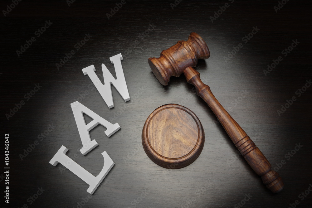 Judges Gavel And Sign Law On Wood Background, Top View Judges Gavel And Sign Law On Wood Background, Top View