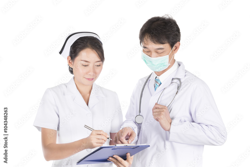Doctor and nurse examine patient data in the hospital Doctor and nurse examine patient data in the hospital