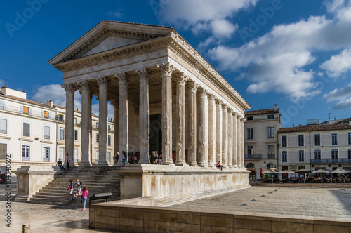 Roman temple Maison Carree in city of Nimes, France..