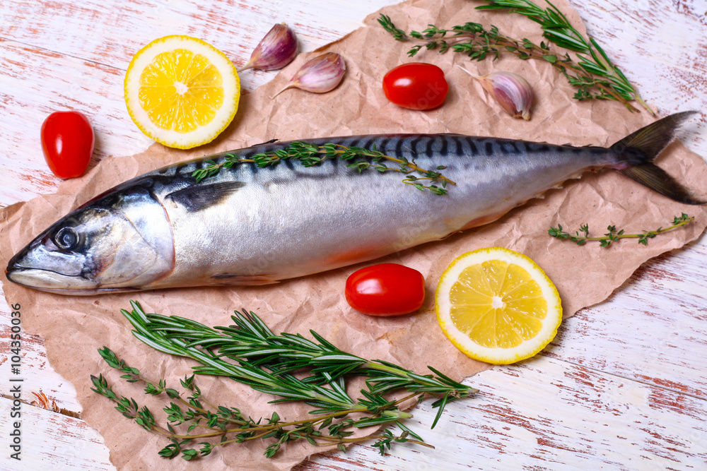 ingredients for baking scomber fillets, include raw mackerel, lemon, garlic, rosemary