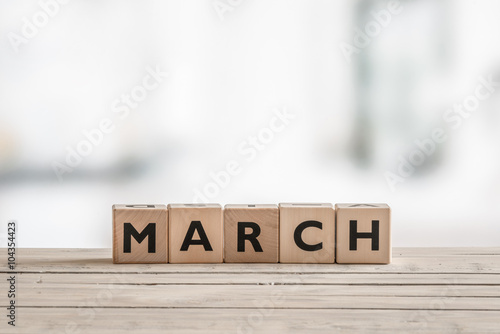 Wooden cubes with the word march photo