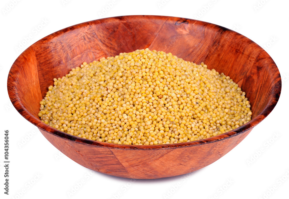 Deep bowl of millet isolated on white Deep bowl of millet isolated on white
