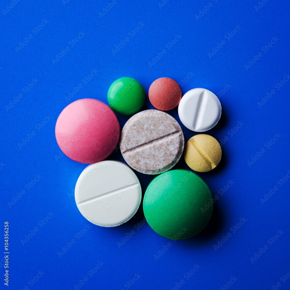 pile of colored tablets pile of colored tablets
