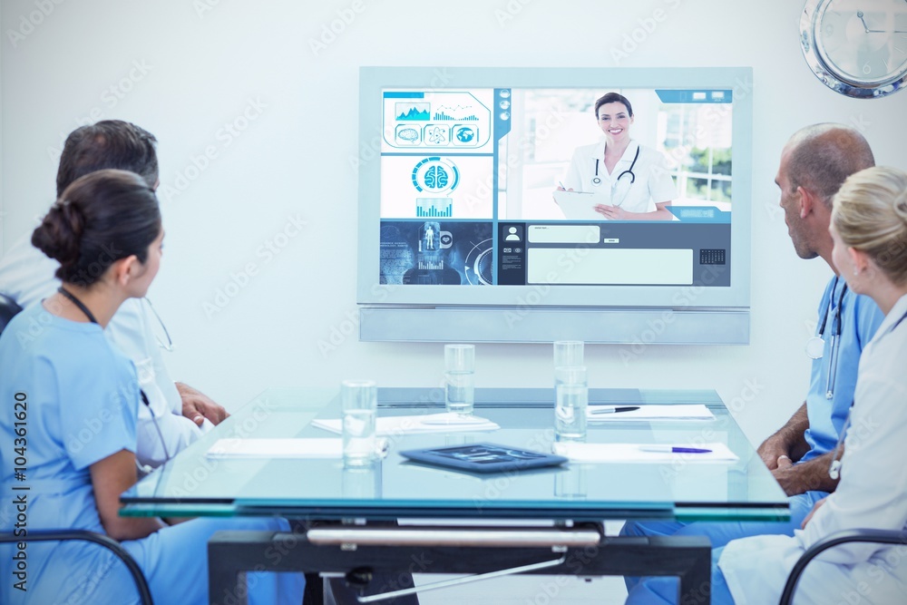 Obraz premium Composite image of team of doctors having a meeting