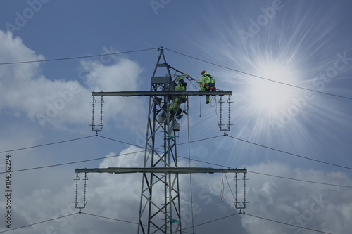people repairing high voltage power line