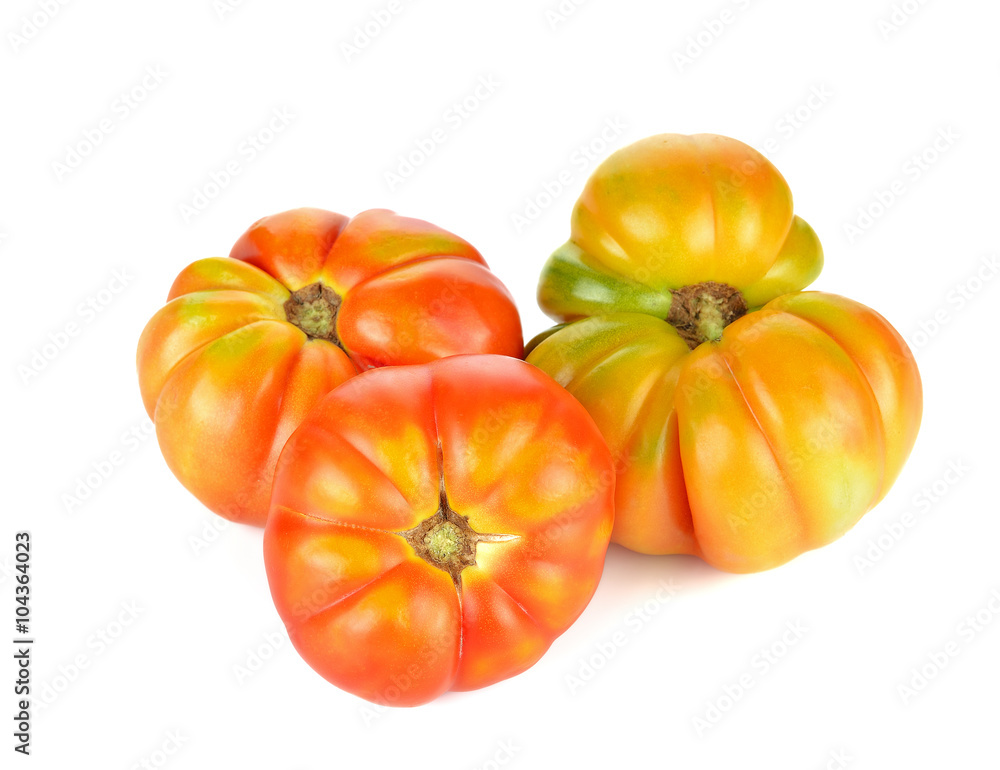 Fototapeta premium big red tomato RAF close-up isolated on white background