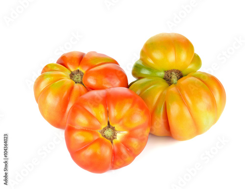 big red tomato RAF close-up isolated on white background