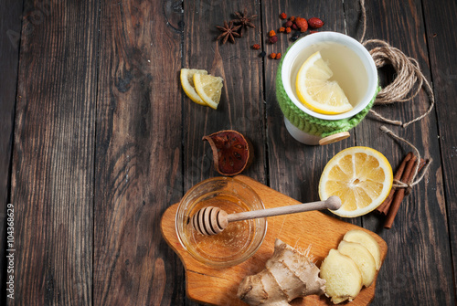cup of green tea with lemon, ginger and cinnamon