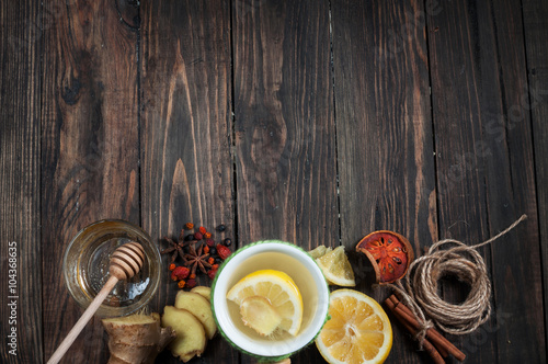 cup of green tea with lemon, ginger and cinnamon. Copy space