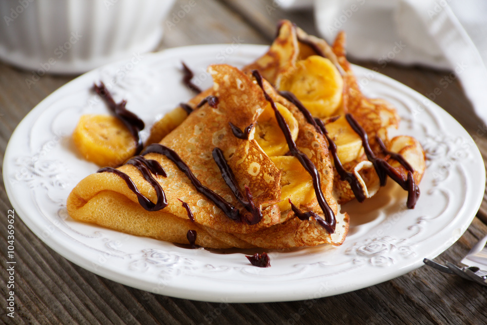Pancakes with bananas and chocolate. Pancakes with bananas and chocolate.
