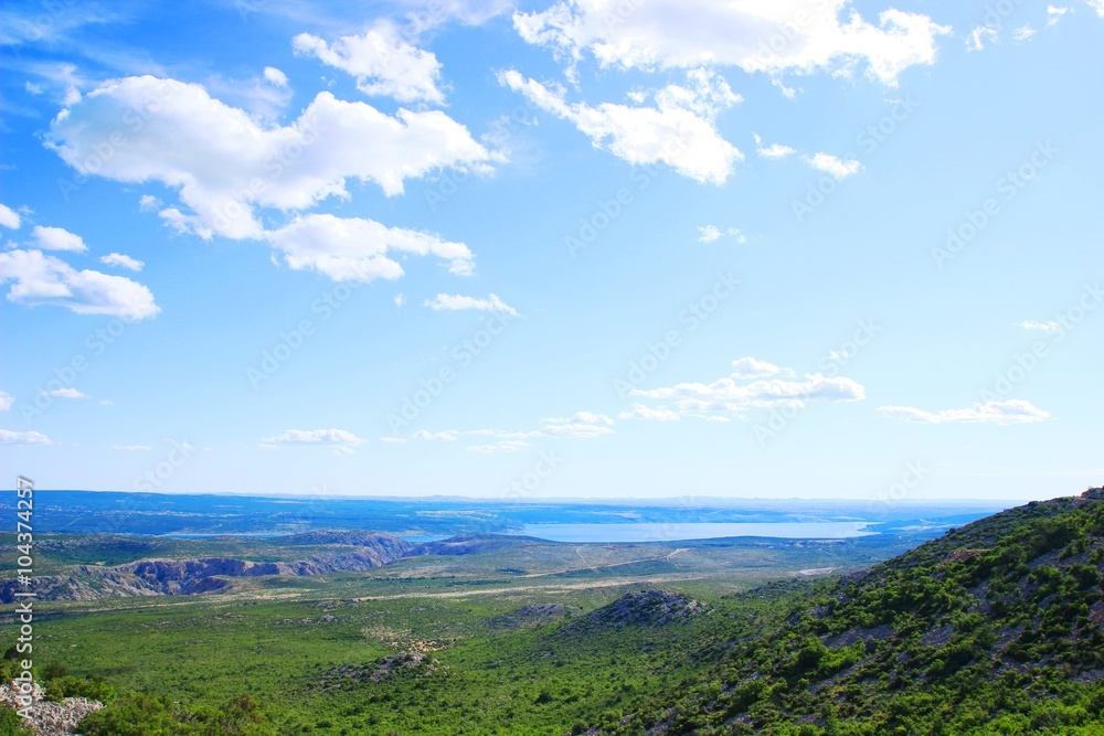 Beautiful landscape with seacoast and partly cloudy sky