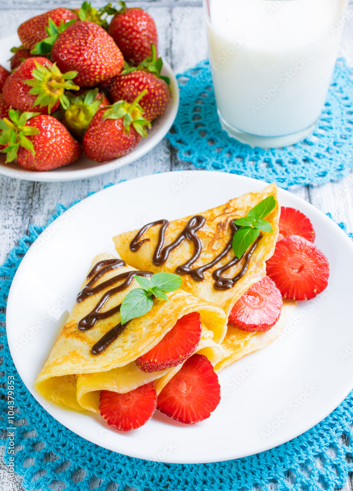 Pancakes with sliced strawberries Pancakes with sliced strawberries