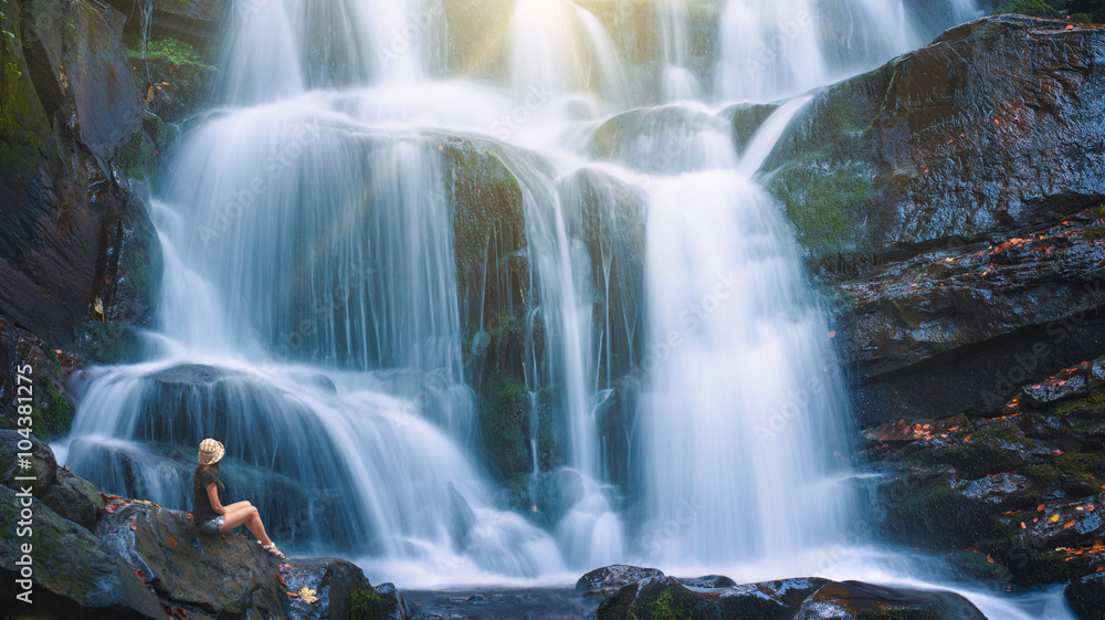 Tourist on waterfall Tourist on waterfall