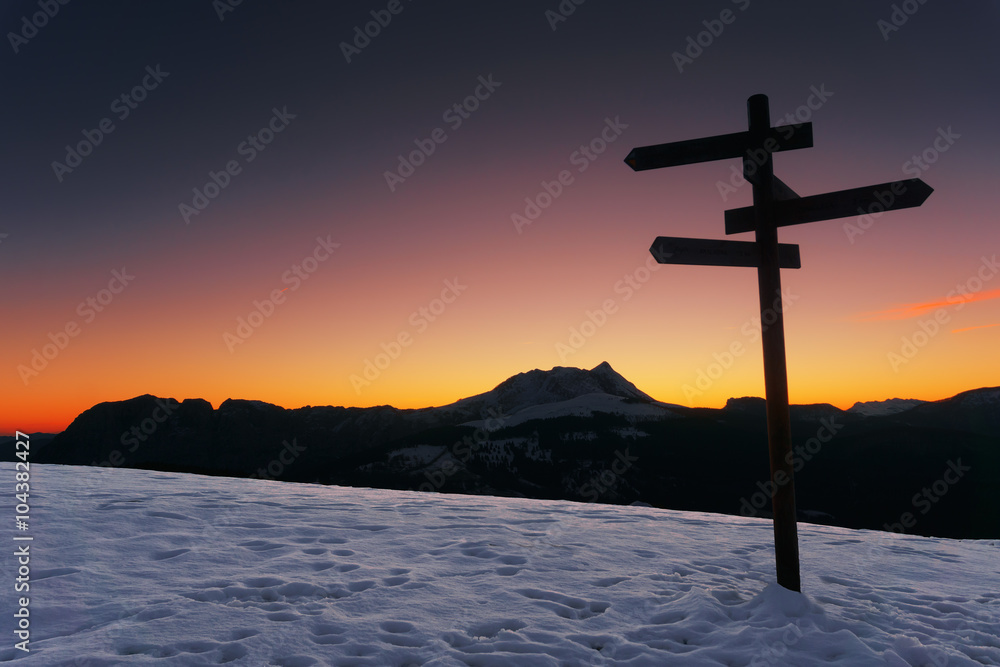wooden signpost in Saibi with view of Anboto mountain