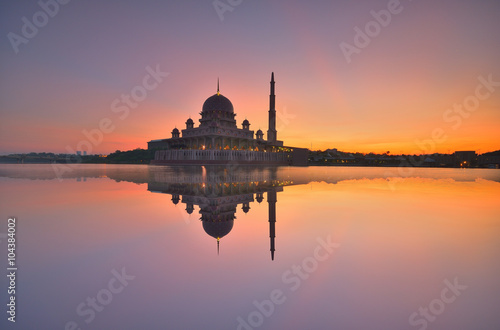 Putra Mosque in Putrajaya  Malaysia at dusk with reflection