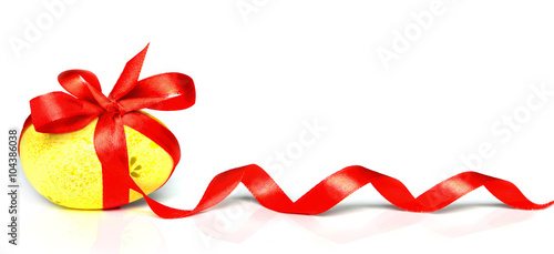 Easter egg with red ribbon 